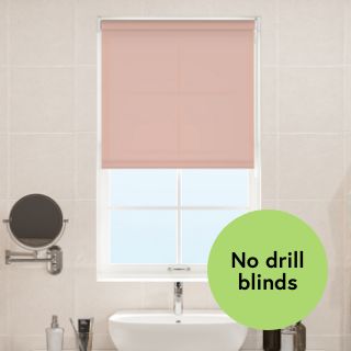 An image of a bathroom with an EasyFit, no drill blind fitted to the window recess. 